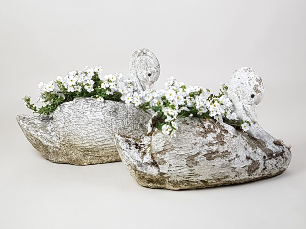 Decorative antique garden swans