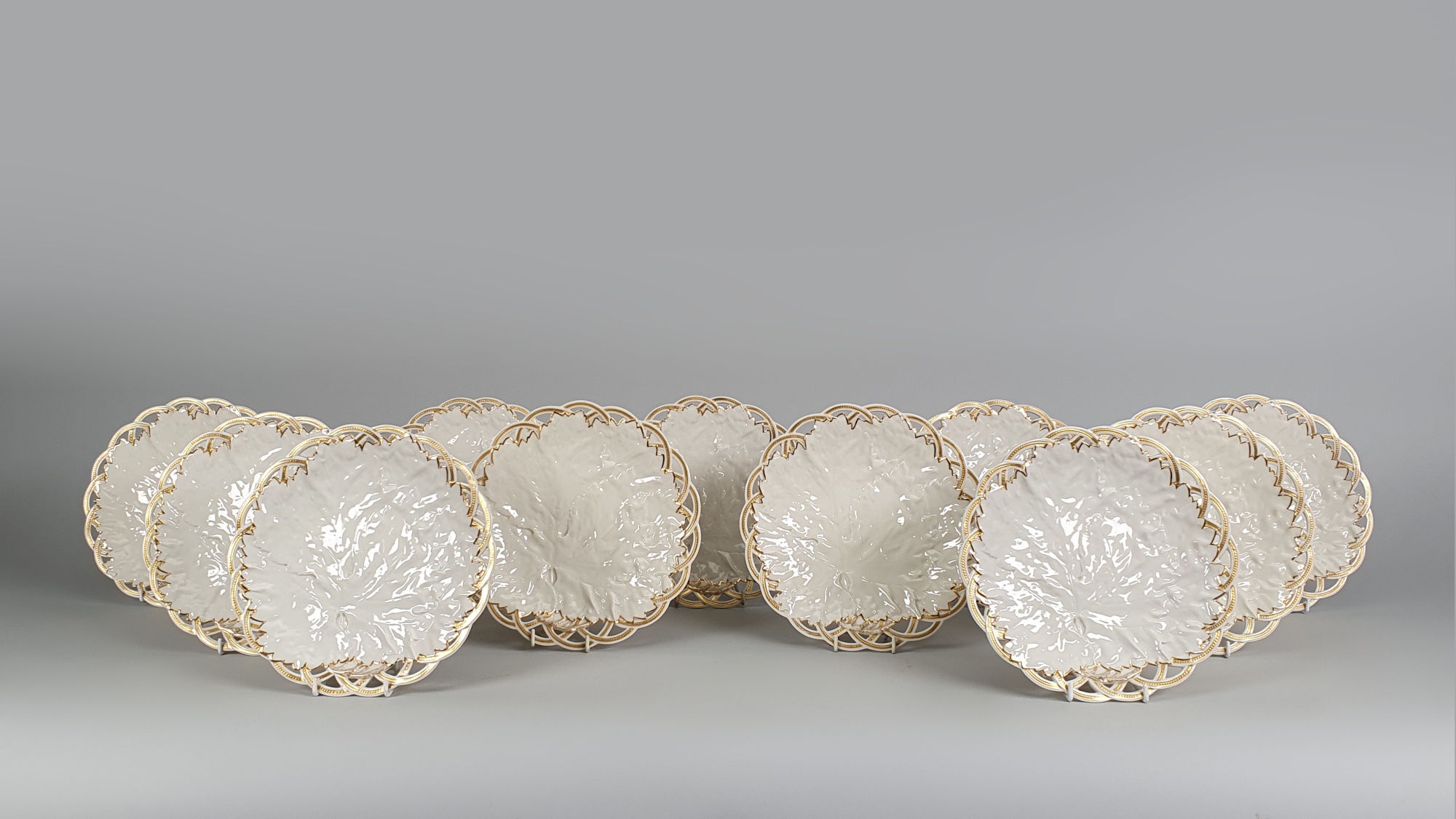 set of Royal Worcester white antique ceramic cabbage leaf plates