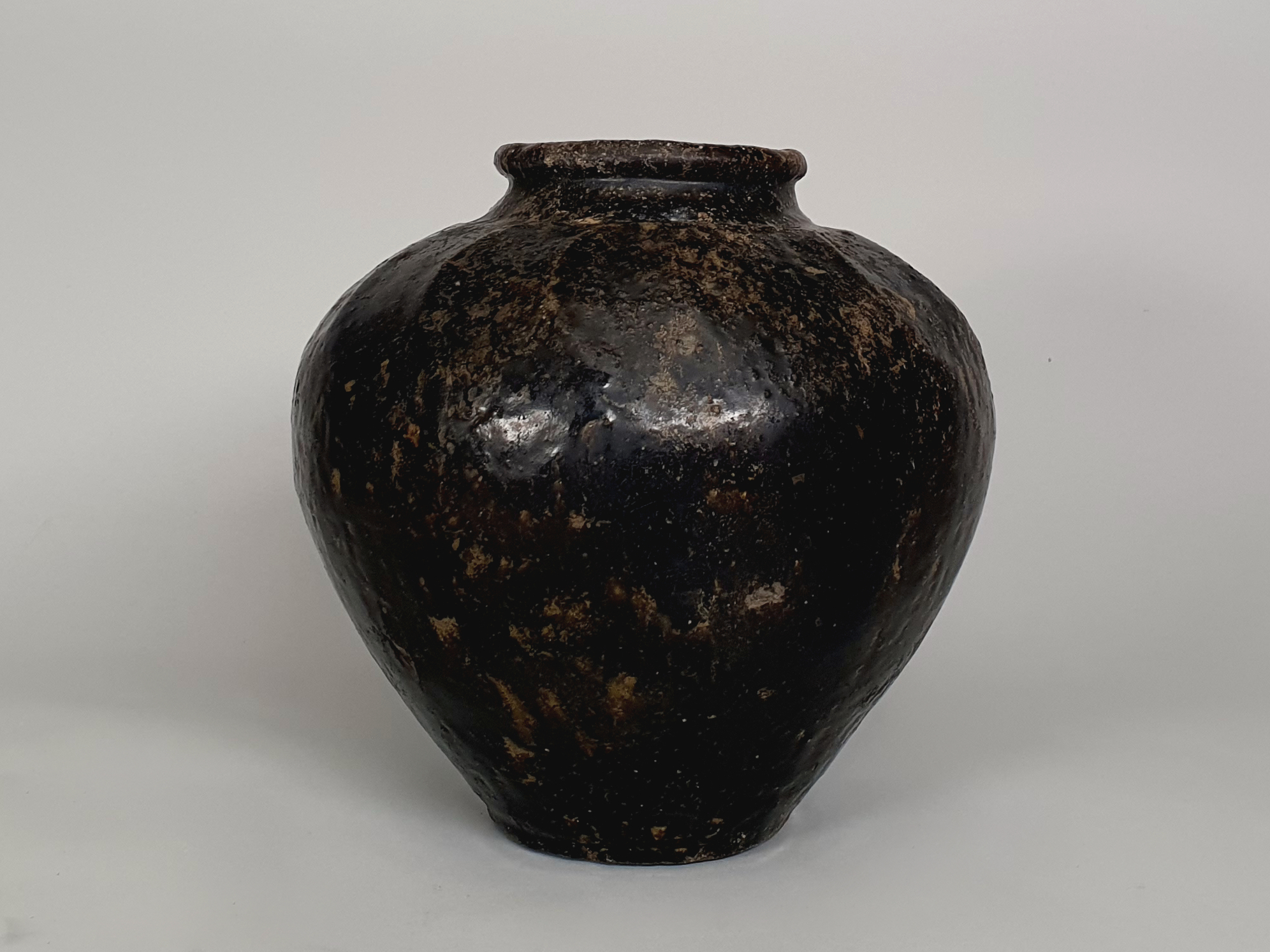 Antique stoneware Chinese wine flagon wide shot