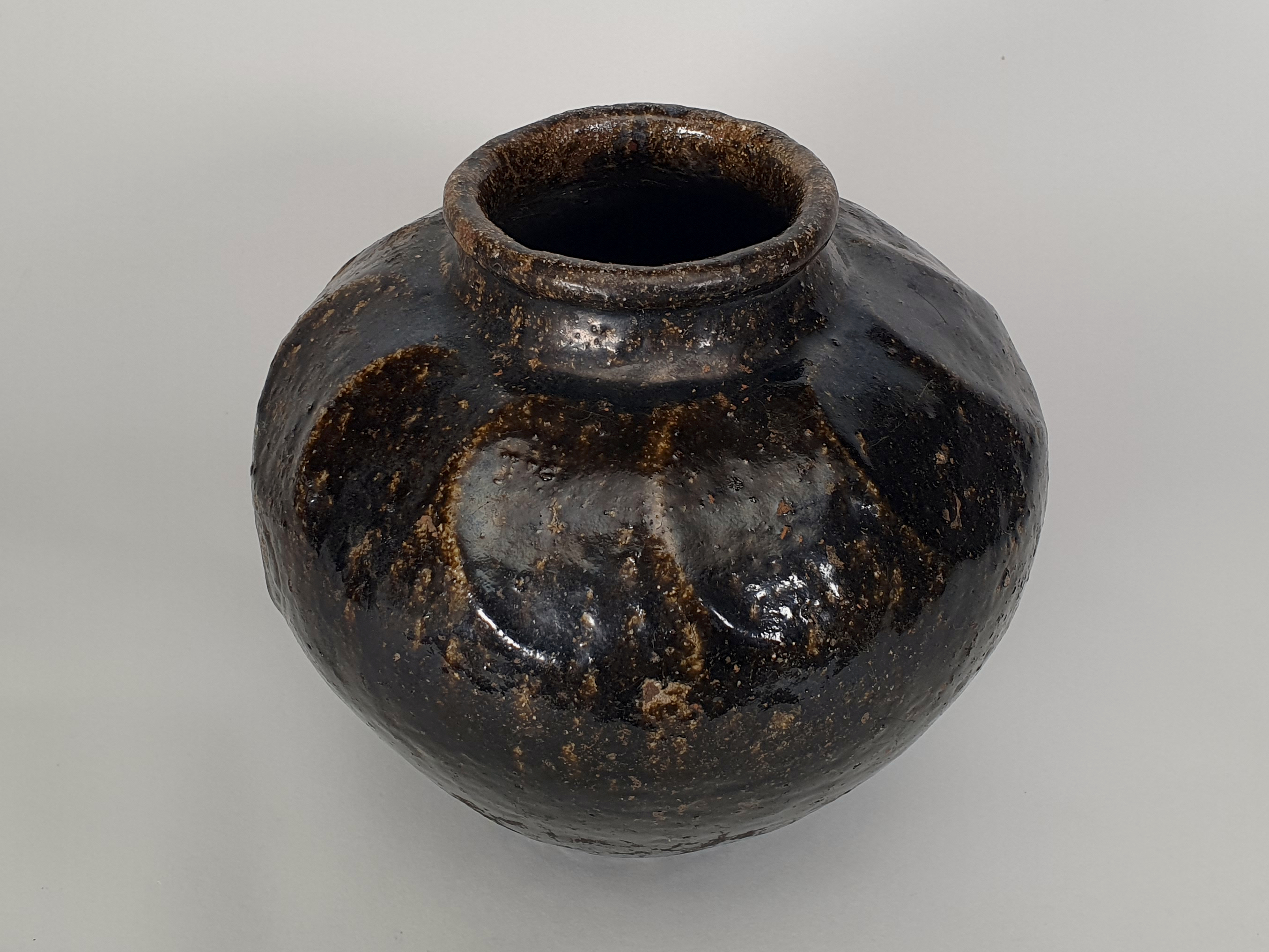 Antique stoneware Chinese wine flagon from angle