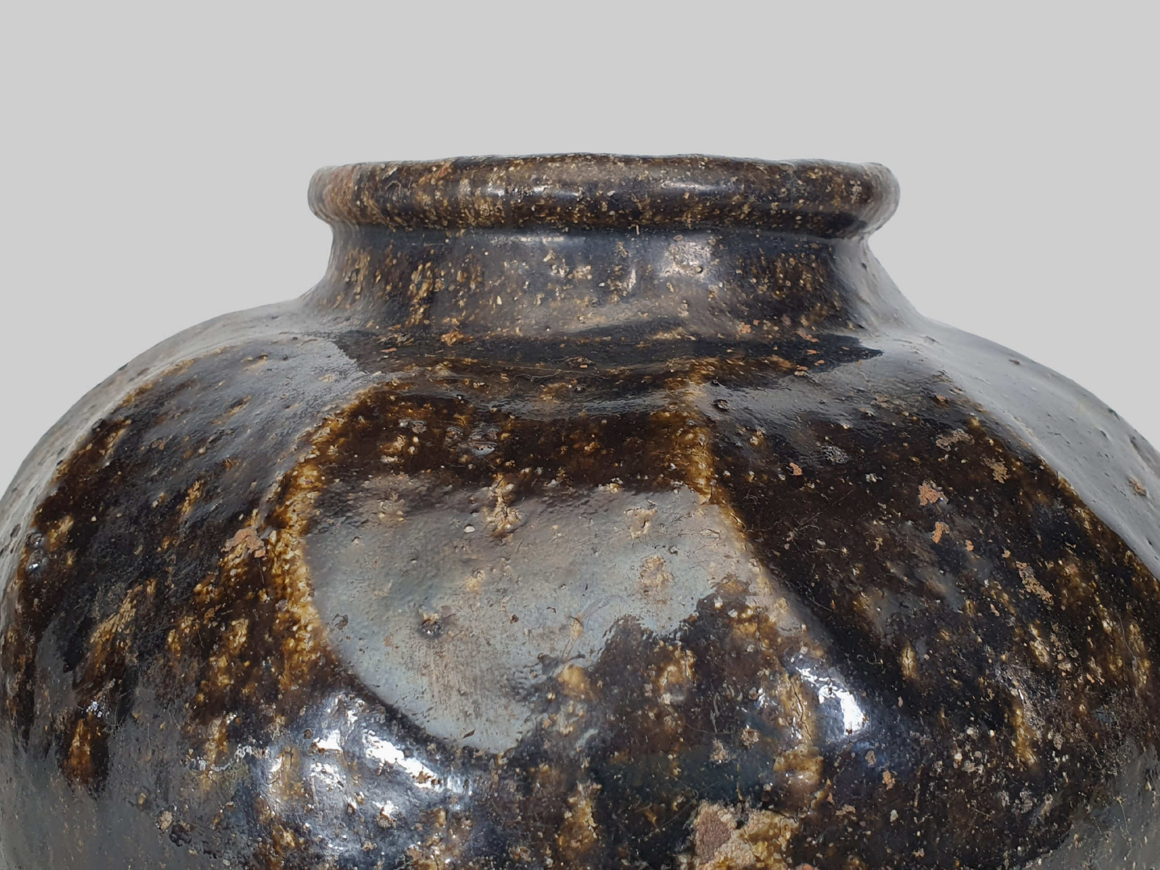Antique stoneware Chinese wine flagon close up of neck