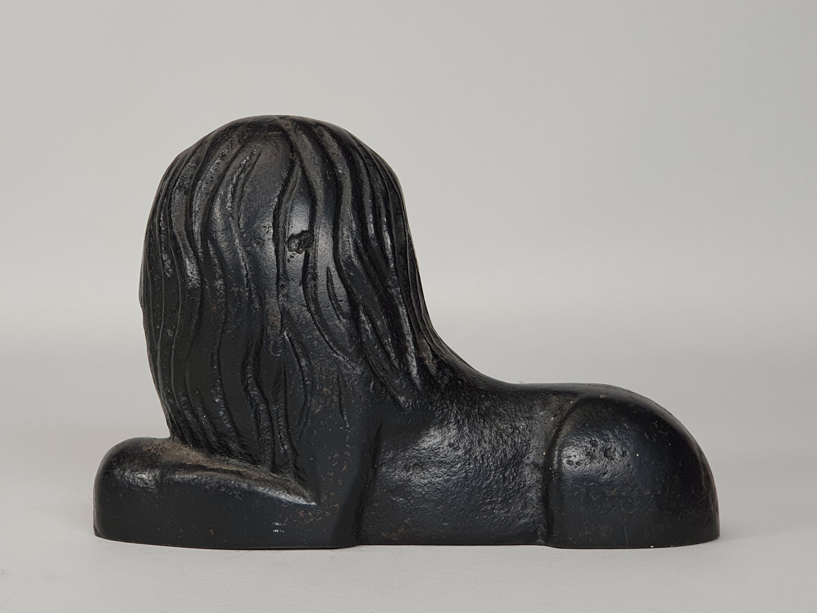 cast iron Lion Door Stop or Door Porter reverse
