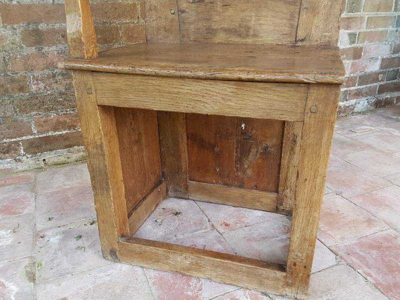 Tall one armed oak Monastery Chair