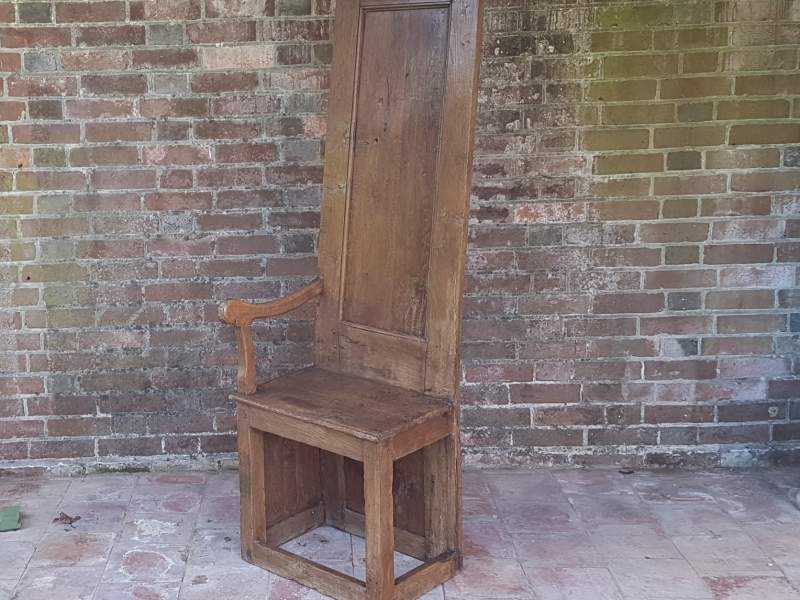 Tall one armed oak Monastery Chair