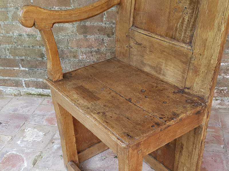 Tall one armed oak Monastery Chair