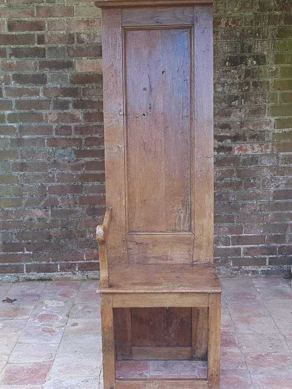 Tall one armed oak Monastery Chair