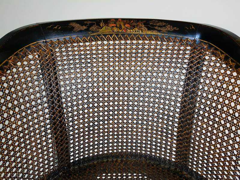 Regency chinoiserie caned arm chair with ball feet