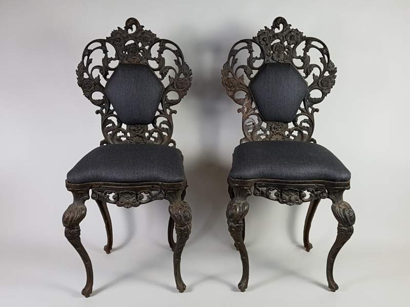 Decorative cast iron Victorian chairs with upholstered seats