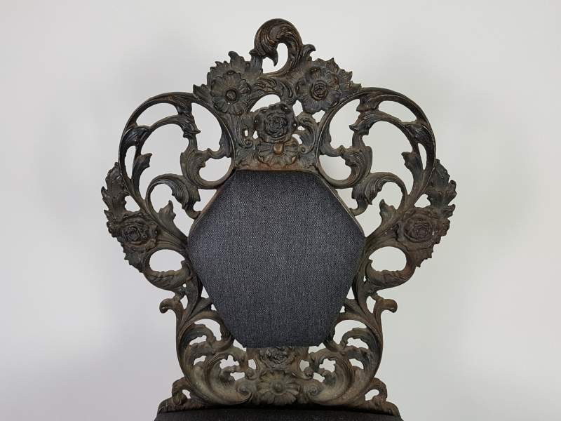 Decorative cast iron Victorian chairs with upholstered seats