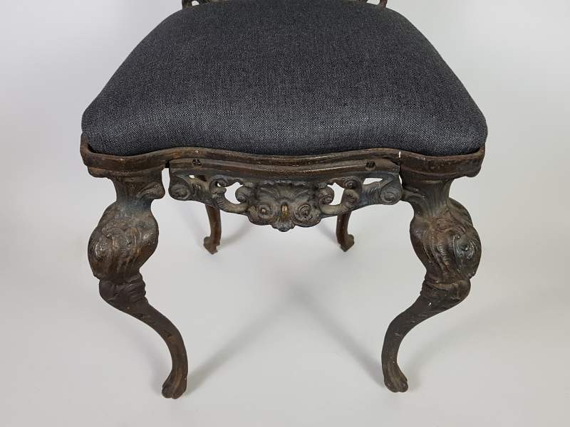 Decorative cast iron Victorian chairs with upholstered seats