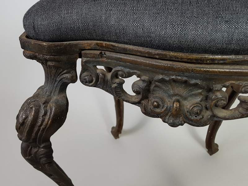 Decorative cast iron Victorian chairs with upholstered seats
