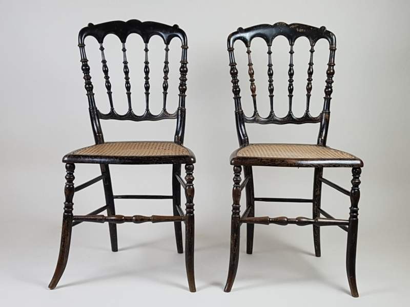Pair of ebonised cane French salon chairs