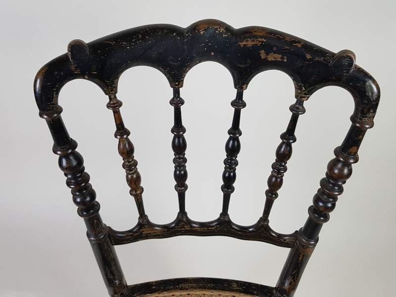 Pair of ebonised cane French salon chairs