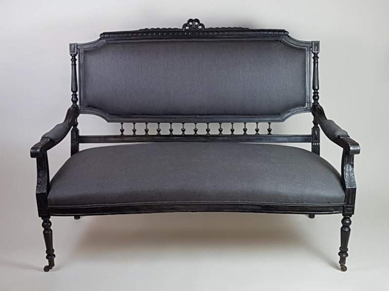 French ebonised Salon Sofa with original castors