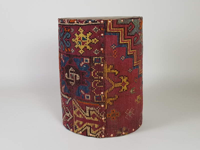Pair of cylindrical Side Tables covered in antique kilim