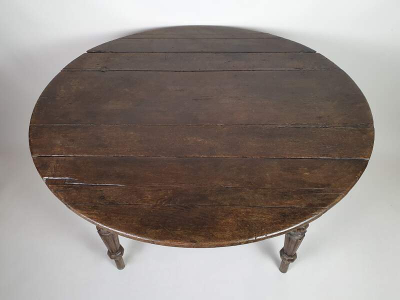 18th century rustic French oak Table with drop leaf sides