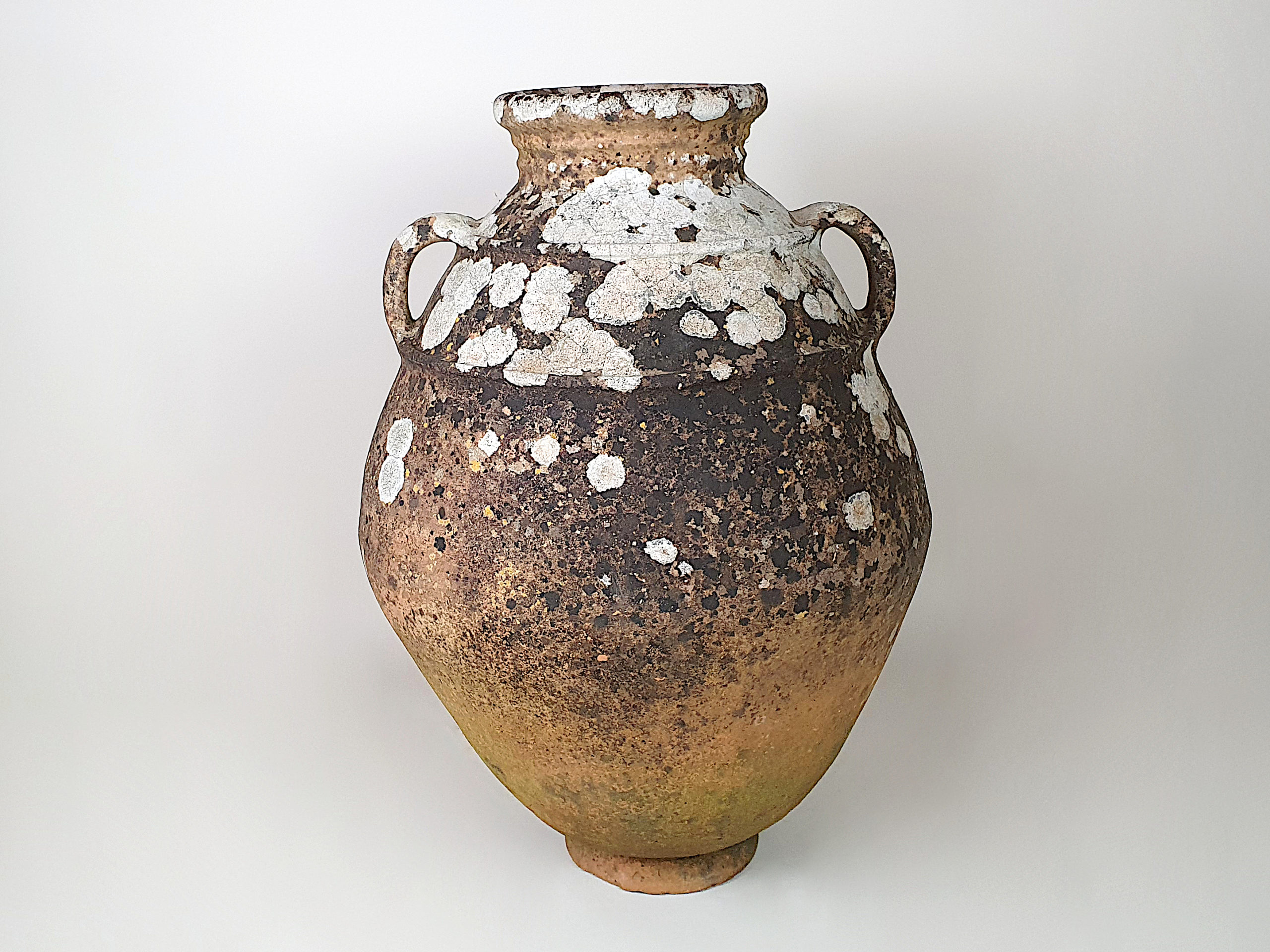 Large terracotta Urn with good covering of moss and lichen