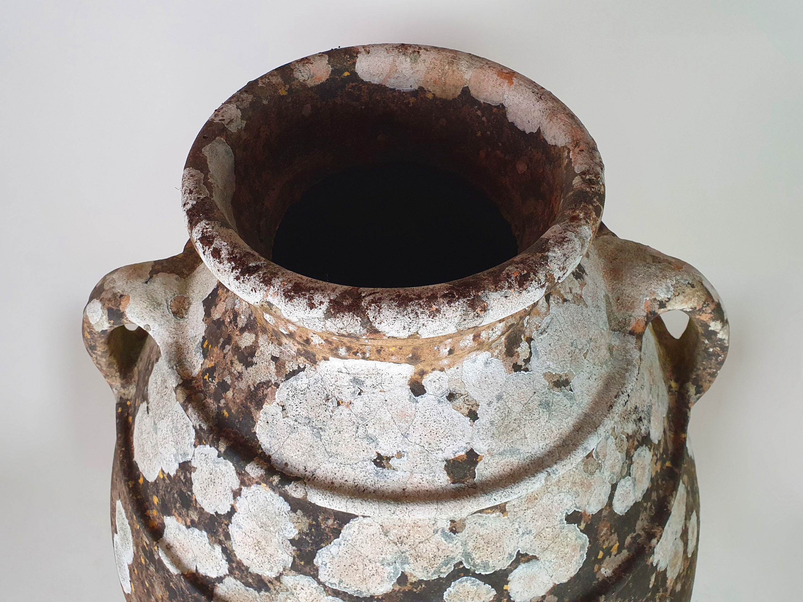 Large terracotta Urn with good covering of moss and lichen