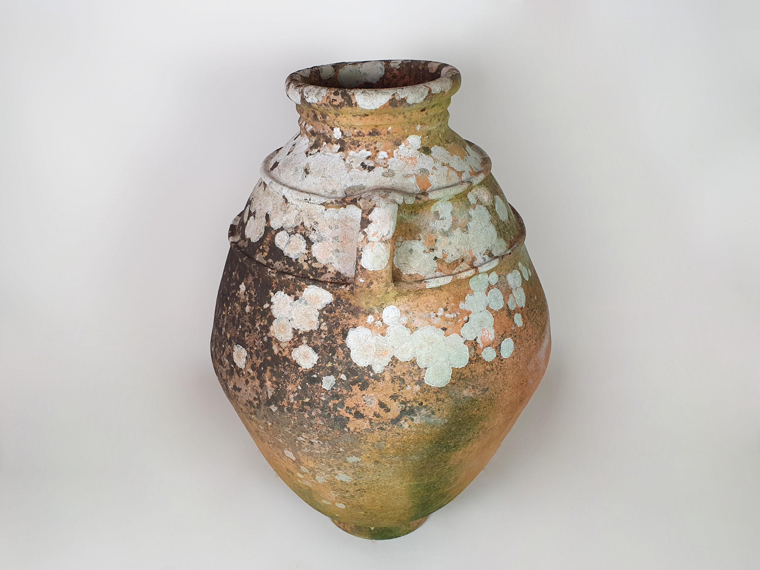 Large terracotta Urn with good covering of moss and lichen