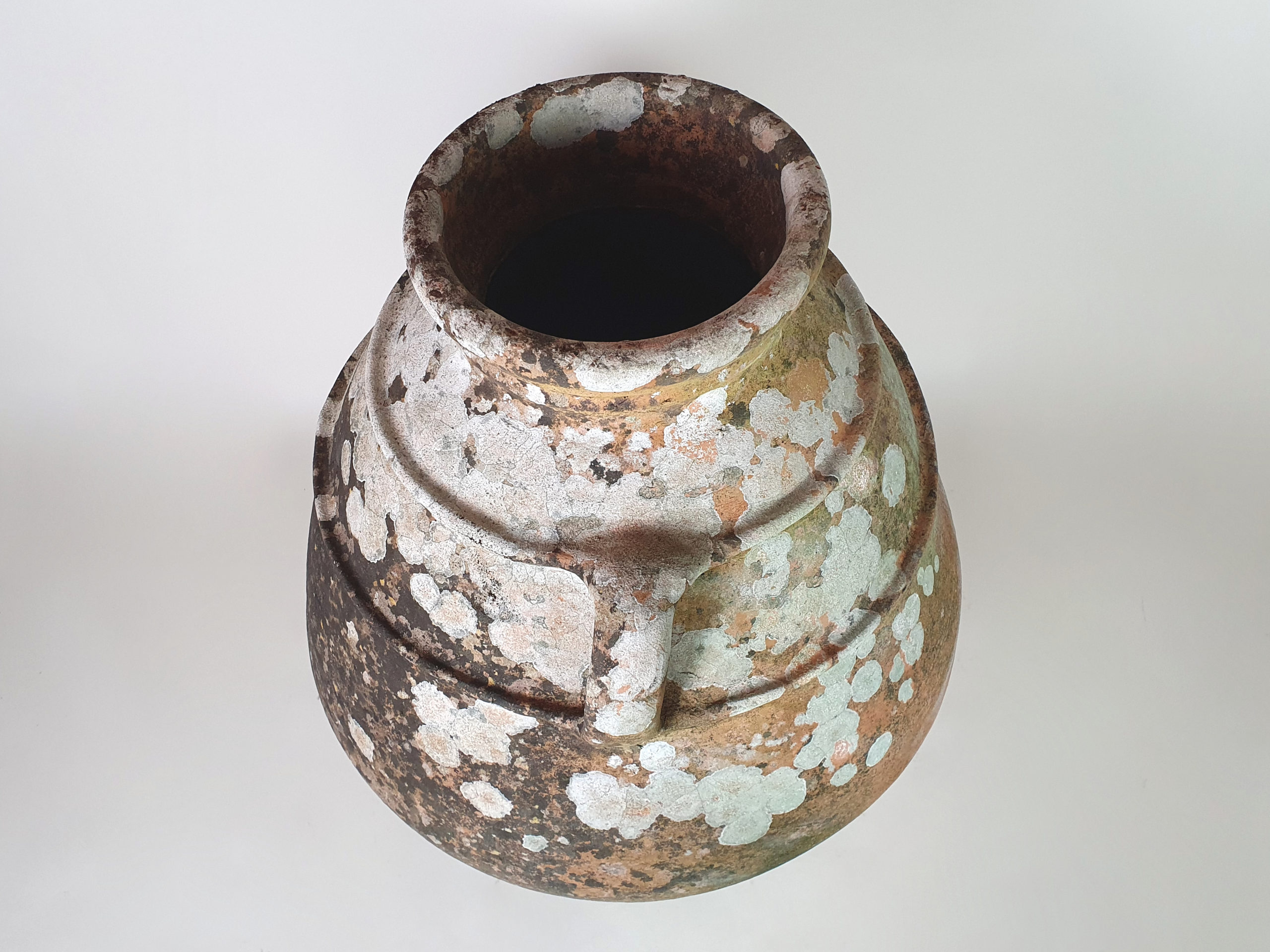 Large terracotta Urn with good covering of moss and lichen