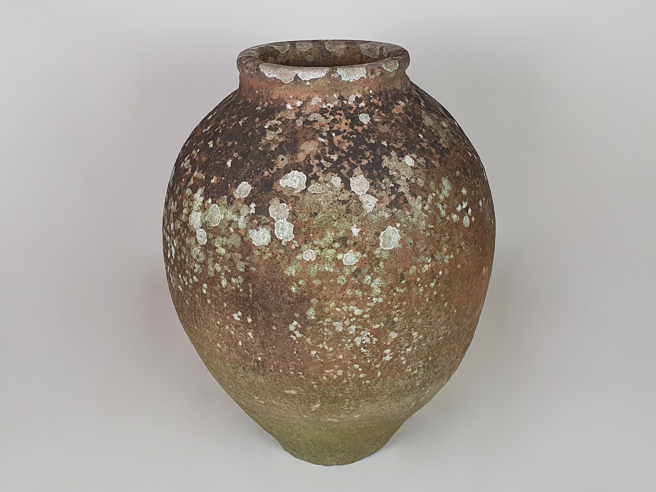 Medium terracotta Urn with good covering of moss and lichen