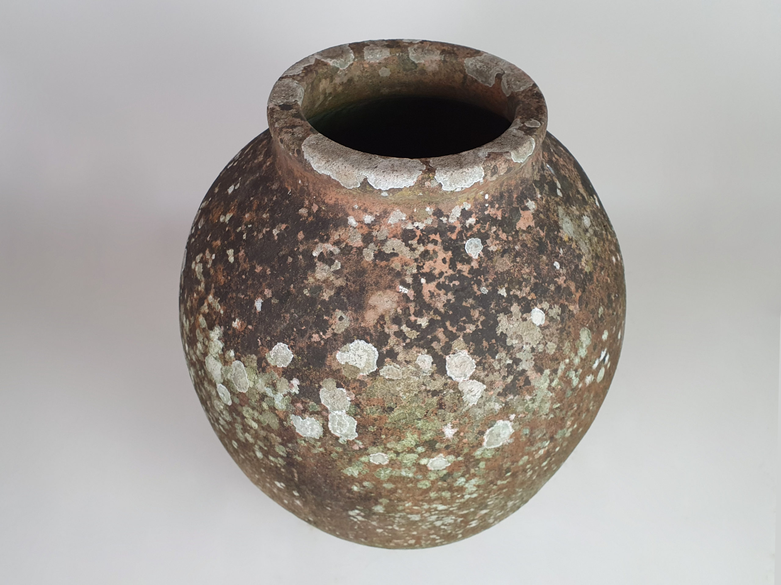 Medium terracotta Urn with good covering of moss and lichen