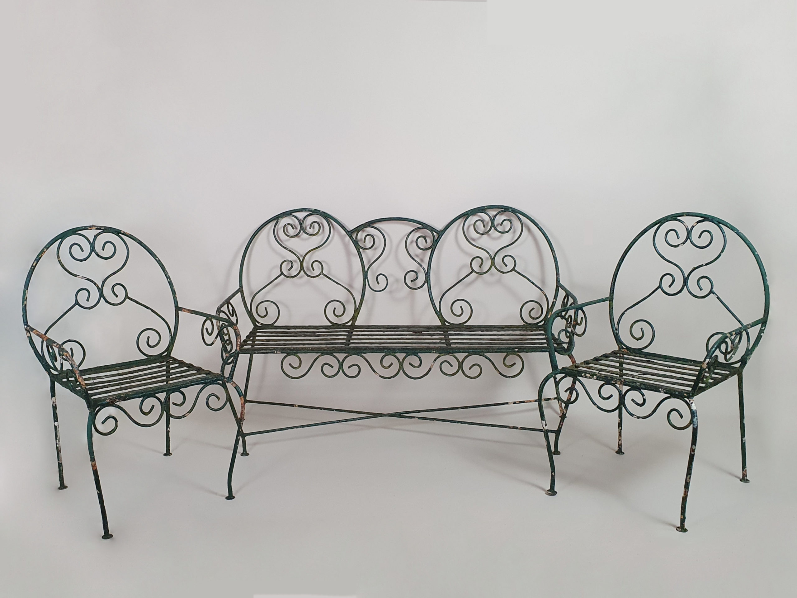 Green wrought iron mid century garden bench and chairs