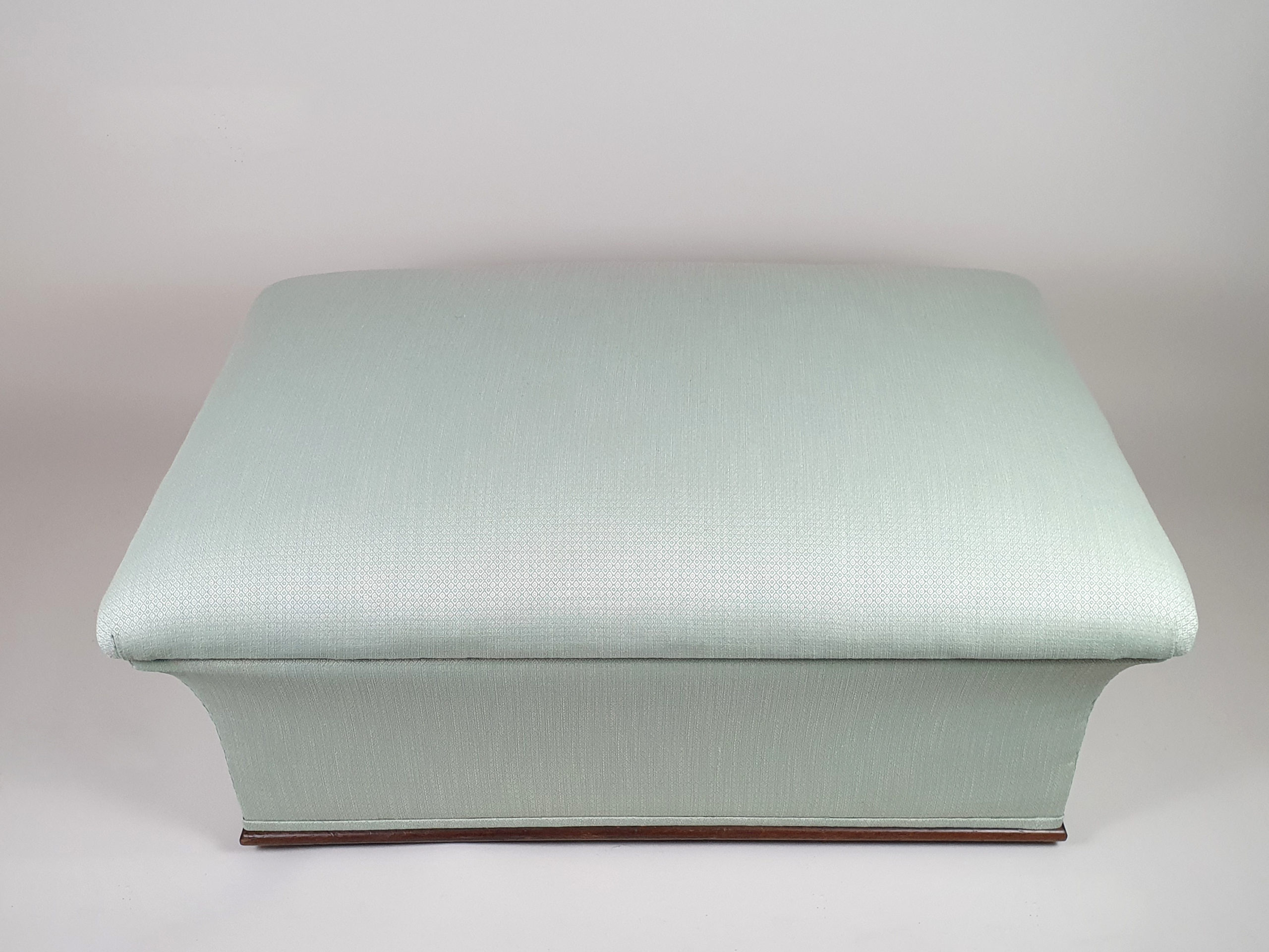 Victorian concave Ottoman, reupholstered in a peppermint geometric fabric
