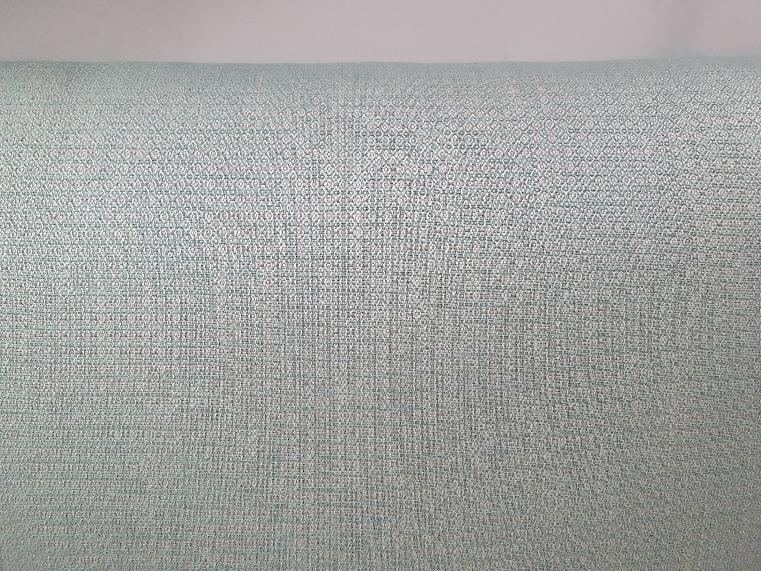 Victorian concave Ottoman, reupholstered in a peppermint geometric fabric