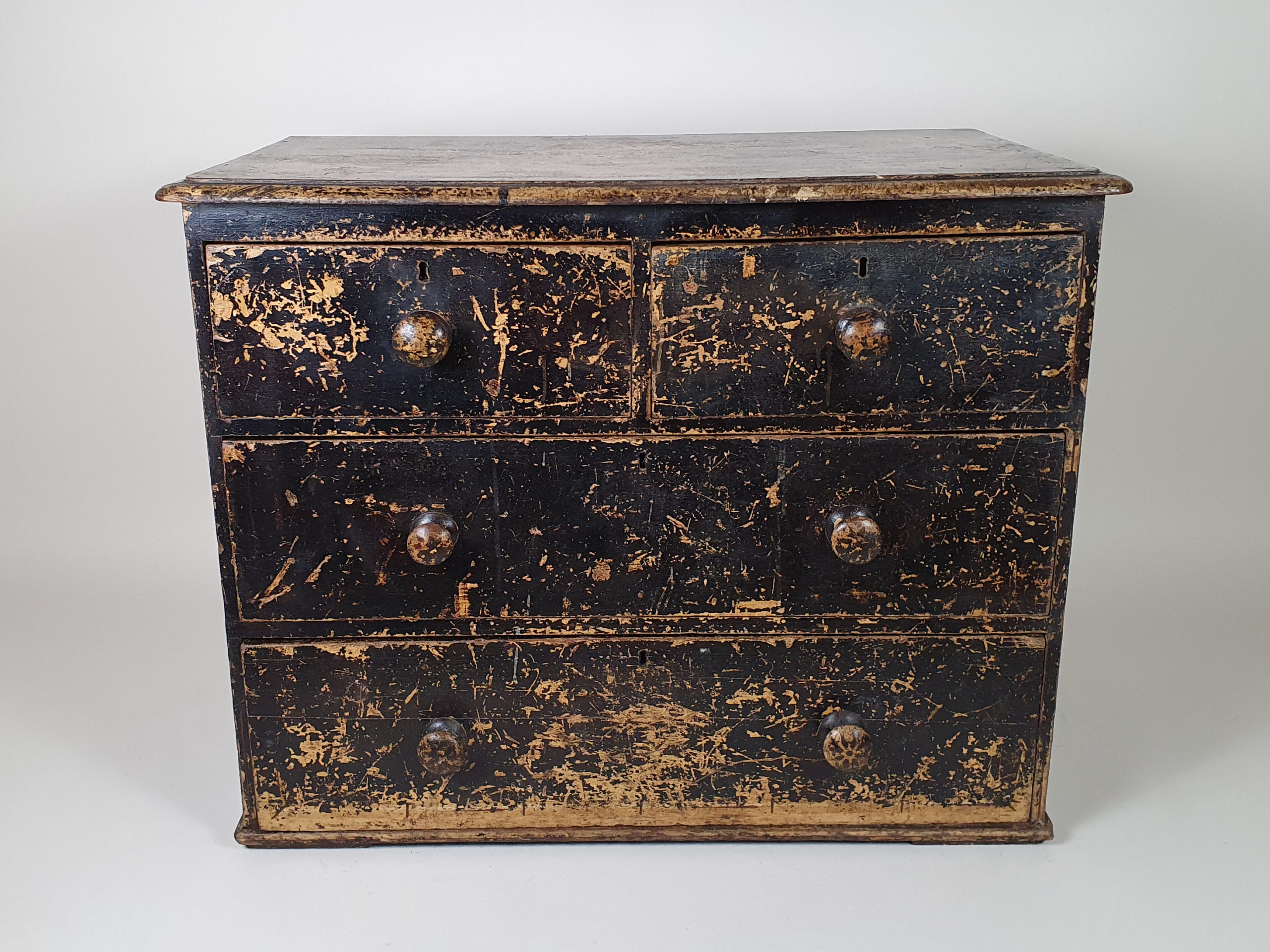 Small Victorian Chest of Drawers with layers of original black paint