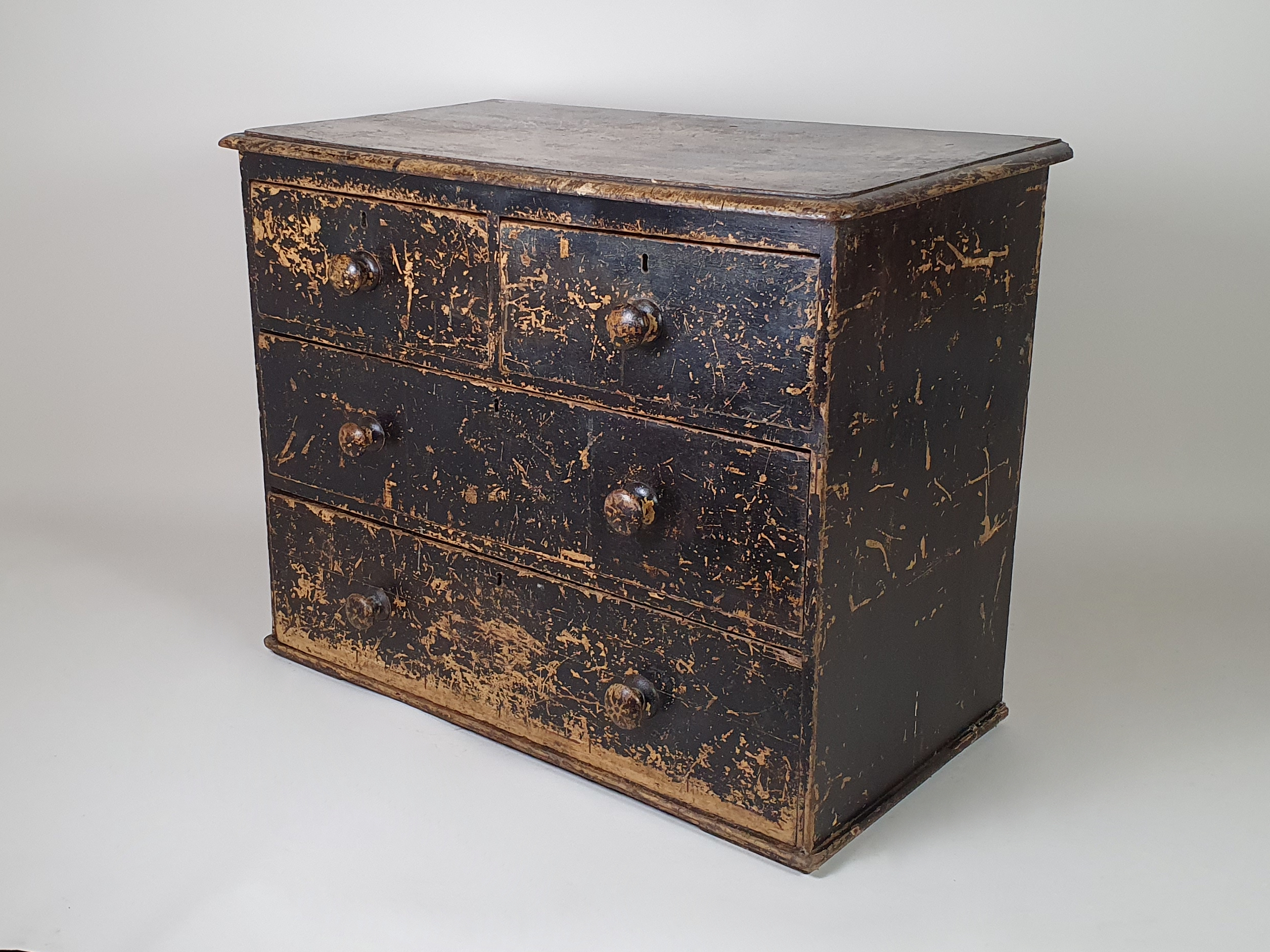 Small Victorian Chest of Drawers with layers of original black paint