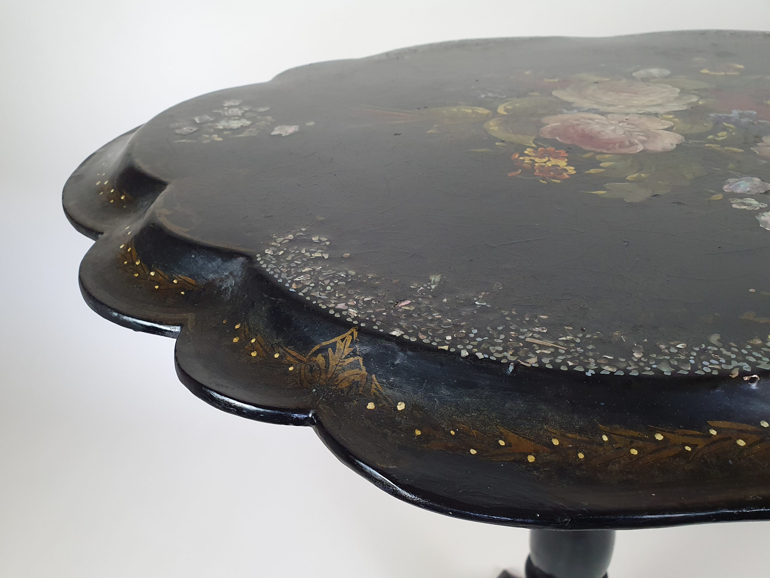 Victorian tilt top papier maché Table with a floral mother of pearl inlay