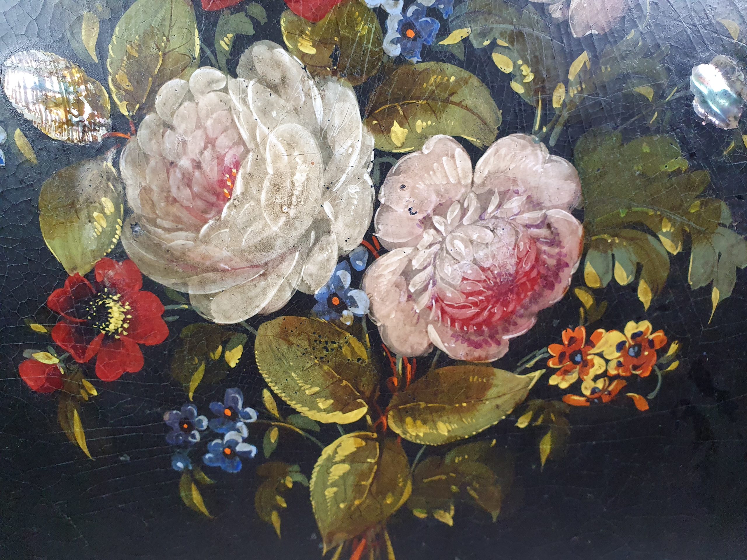 Victorian tilt top papier maché Table with a floral mother of pearl inlay