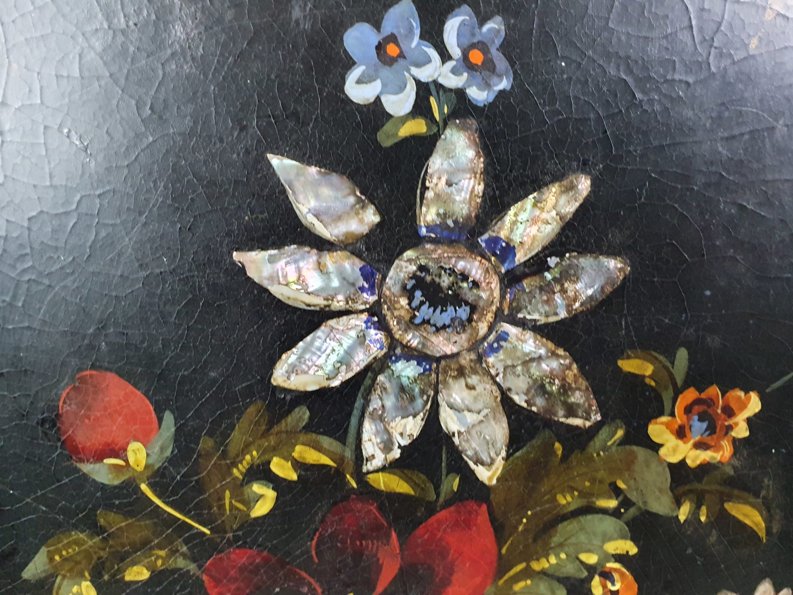 Victorian tilt top papier maché Table with a floral mother of pearl inlay