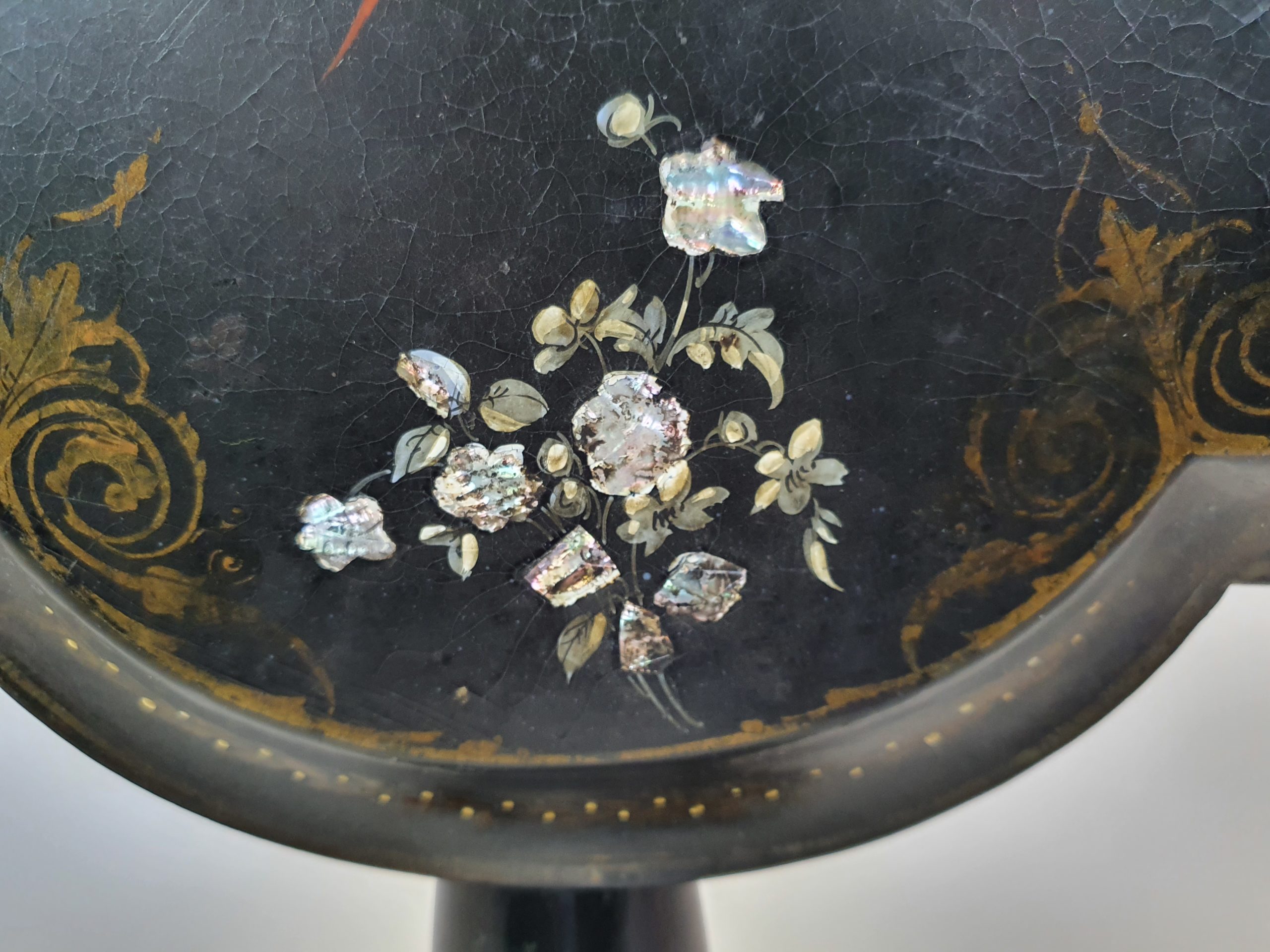 Victorian tilt top papier maché Table with a floral mother of pearl inlay