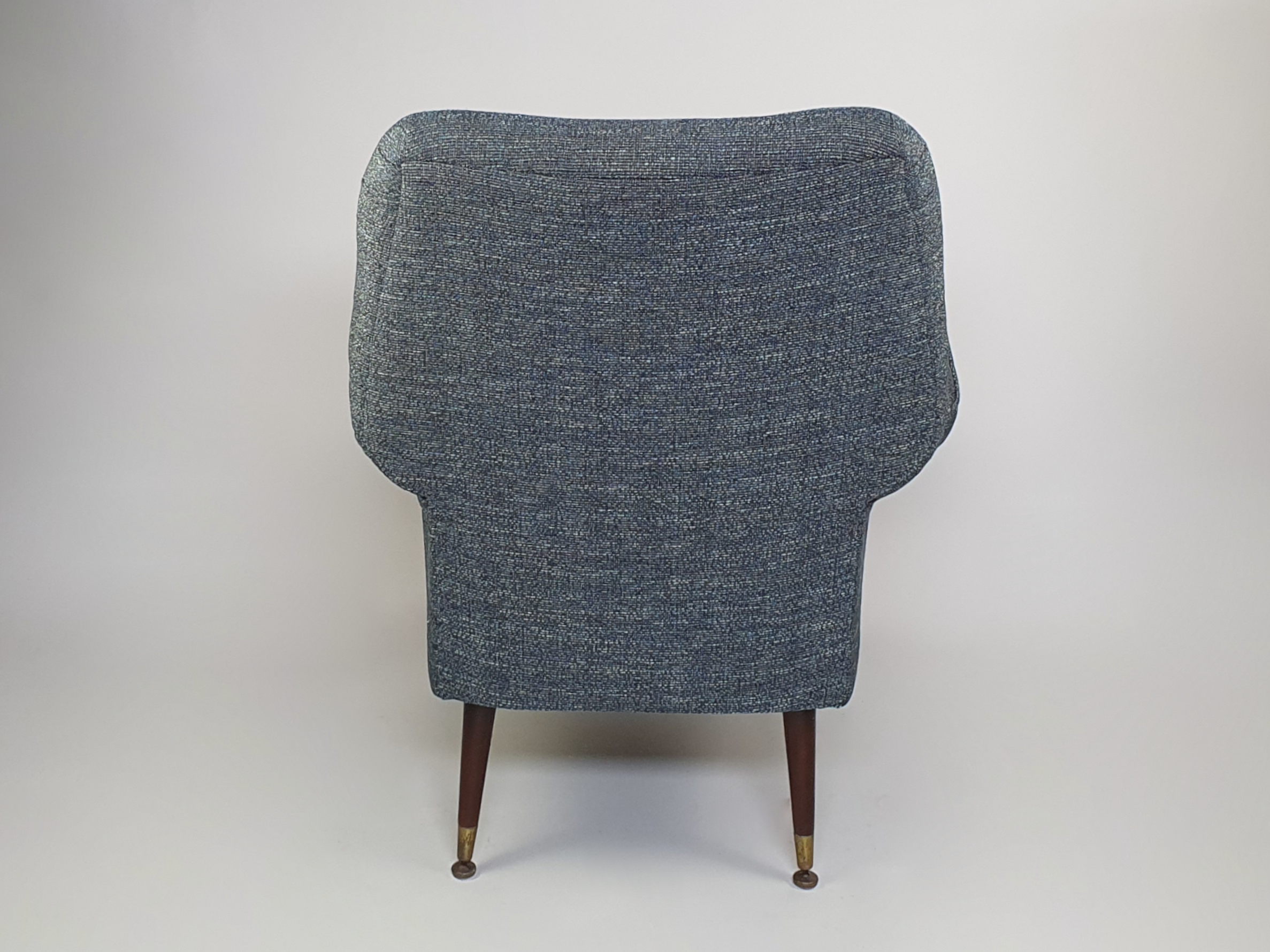A smart pair of distinctively designed mid century Armchairs