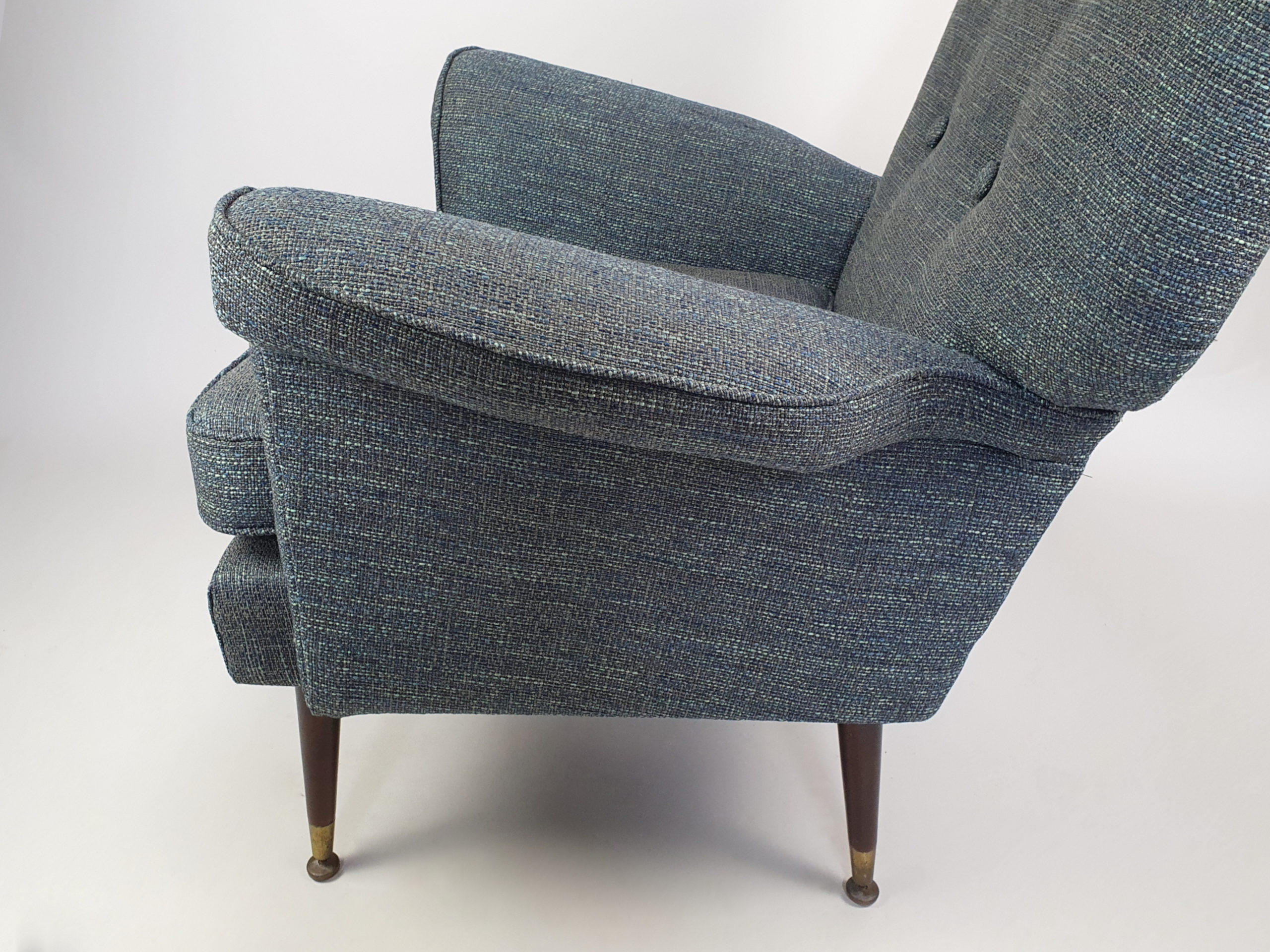 A smart pair of distinctively designed mid century Armchairs