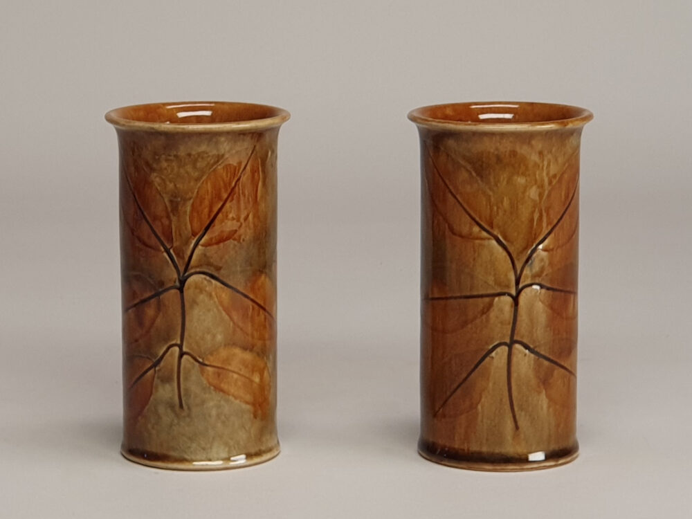 A pair of Royal Doulton stoneware vases - autumn foliage & autumn leaves, by Maud Bowden