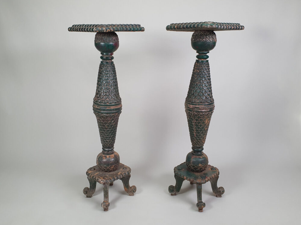 A pair of decorative antique Torchères in original green paint
