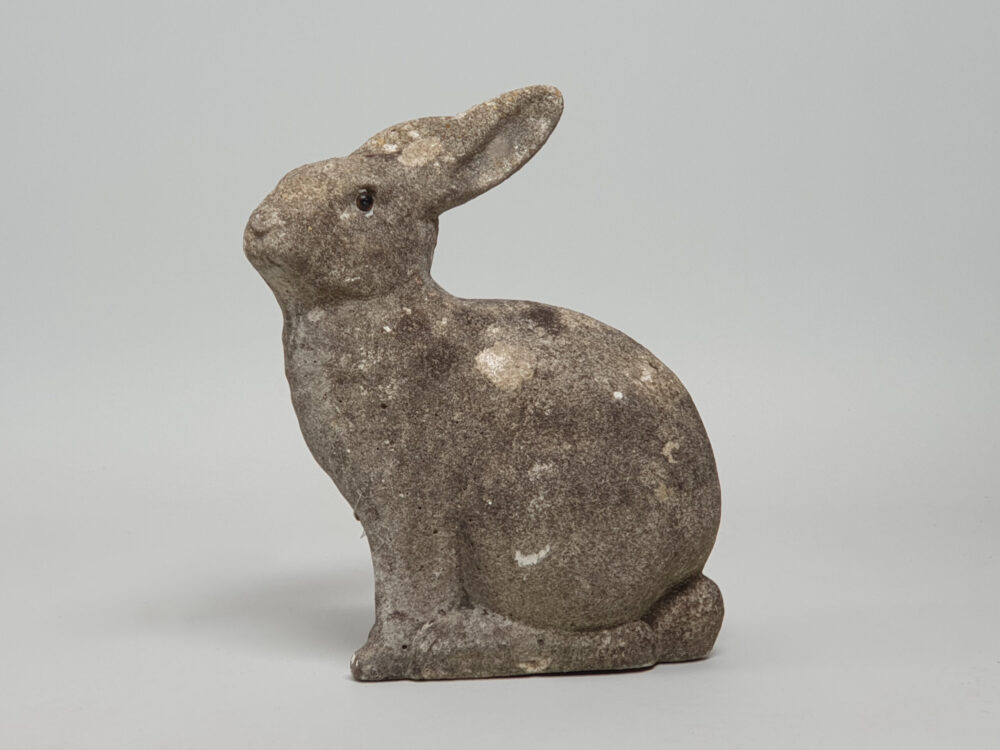 A well weathered Rabbit antique garden ornament