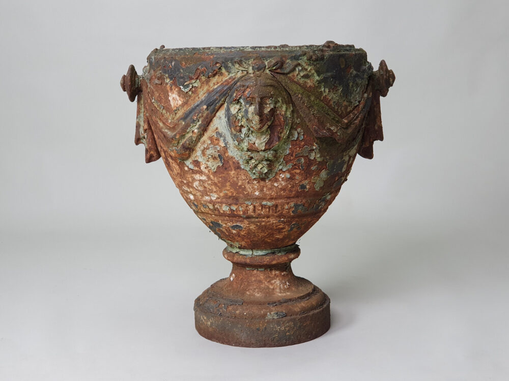 An Adam style 19th century antique garden urn with original paint