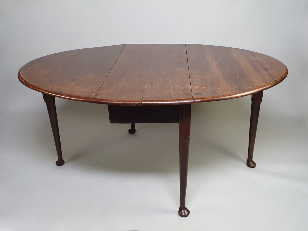 Antique Georgian mahogany oval drop leaf Table