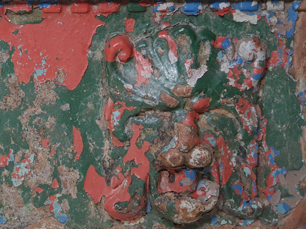 Antique cast iron Hopper with lion decoration & original paint