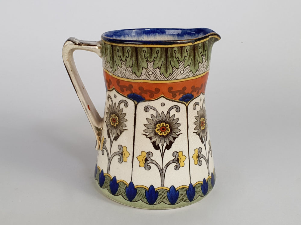 Antique ceramic Royal Doulton jug in an Art Nouveau design