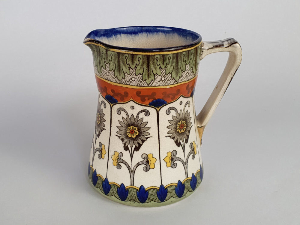 Antique ceramic Royal Doulton jug in an Art Nouveau design