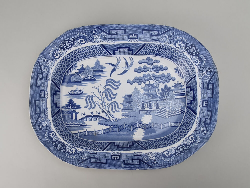 Antique ceramic willow pattern Platter or Meat Plate with a comb back or combed back