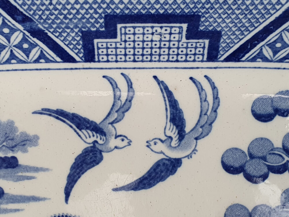 Antique ceramic willow pattern Platter or Meat Plate with a comb back or combed back