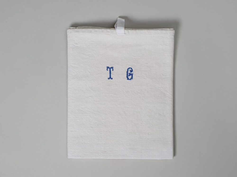 Antique linen hand woven Torchons, or Tea Towels, with hand stitched monogram T G