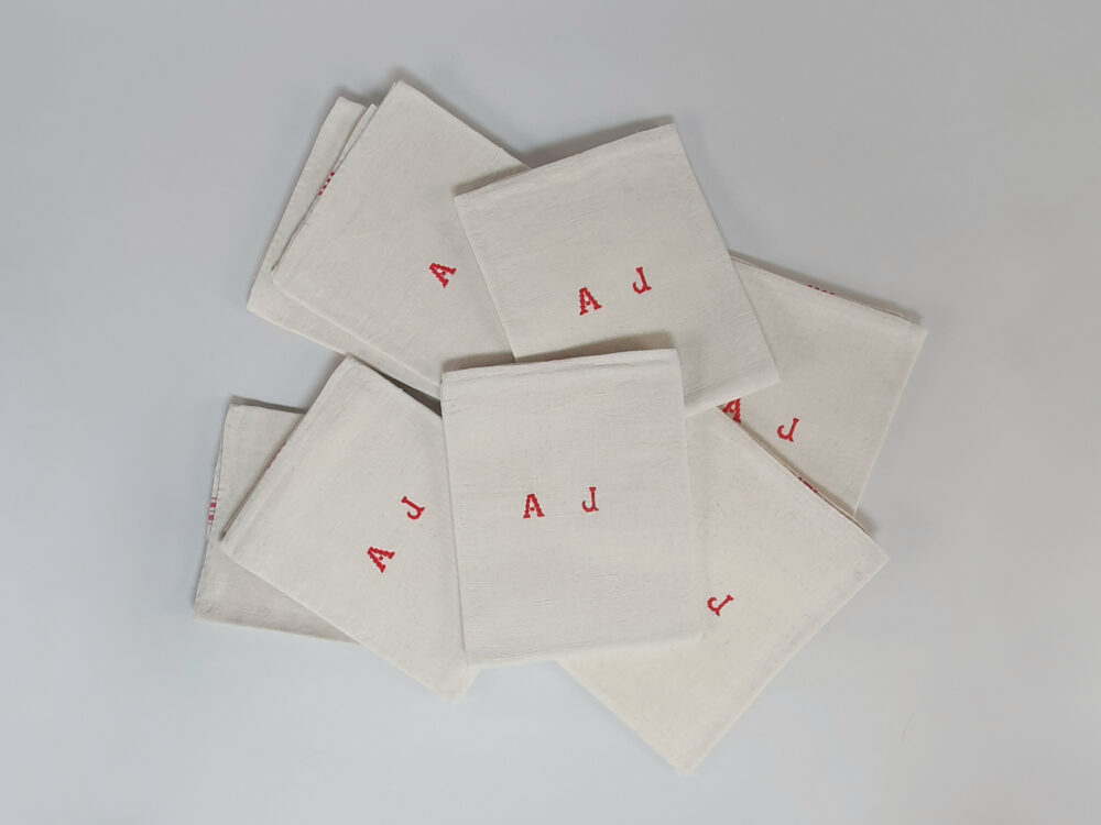 Antique linen hand woven Torchons, or Tea Towels, with red stripes & hand stitched monogram A J