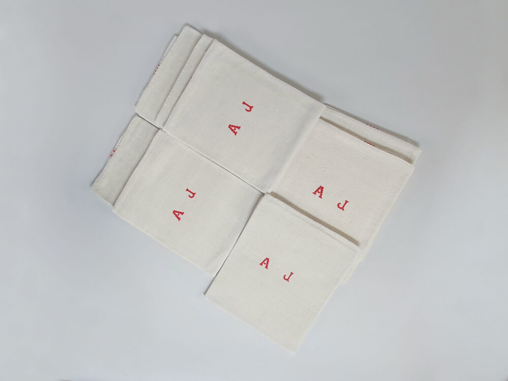 Antique linen hand woven Torchons, or Tea Towels, with red stripes & hand stitched monogram A J